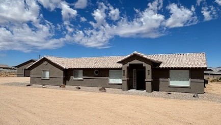 2191 Seneca Street Kingman, AZ 86401 - Photo 1 of 26 a front view of a house with a garage
