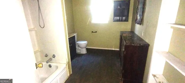 a bathroom with a sink and a toilet