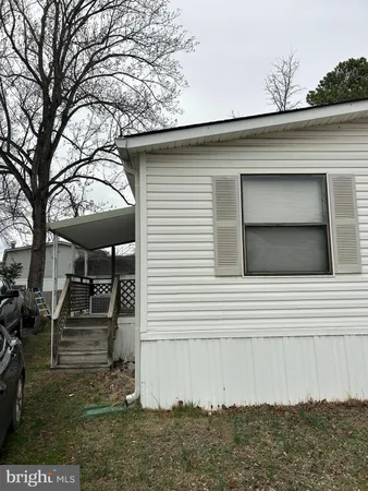 a front view of a house with garage