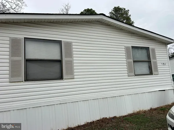 a view of a house with a large window