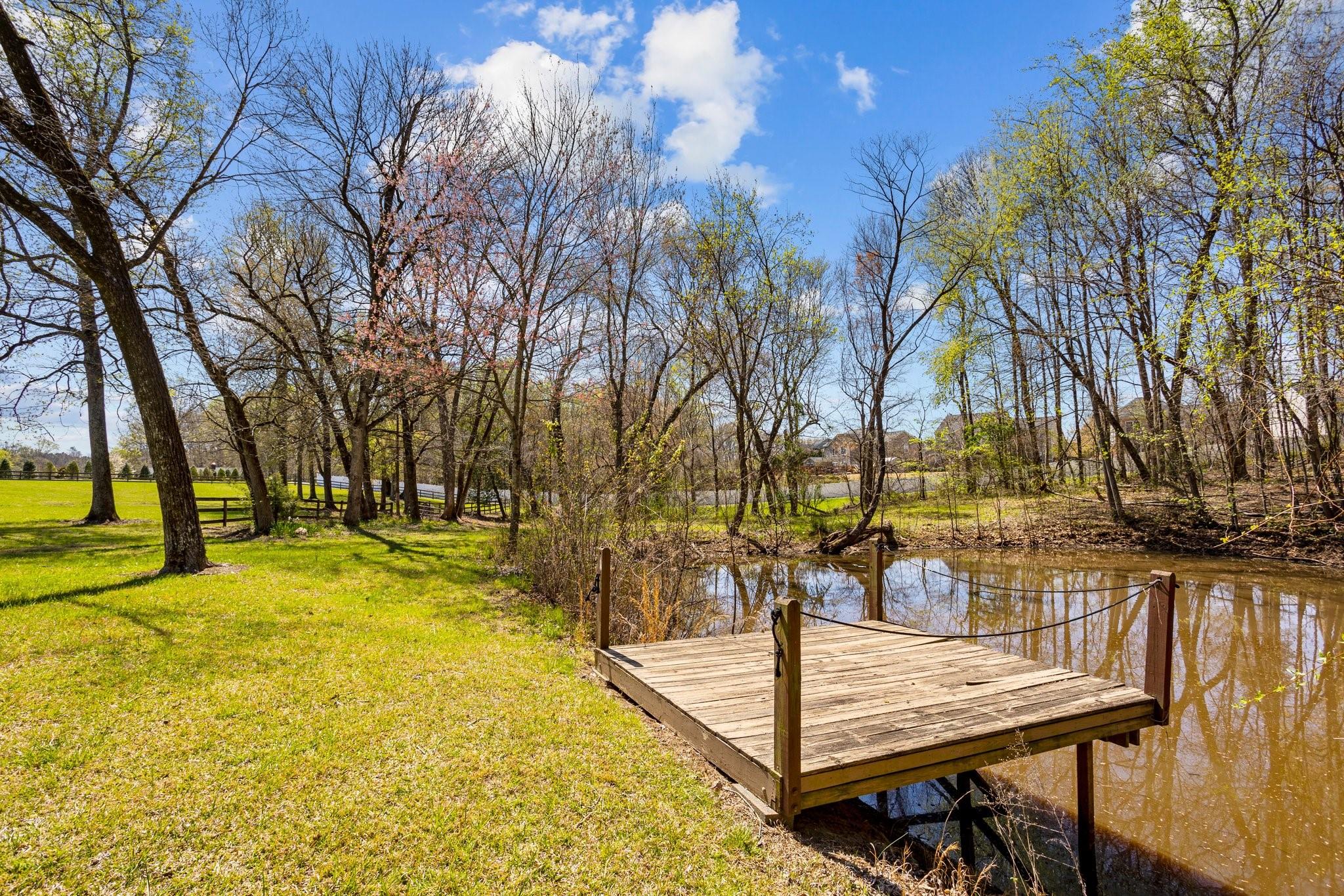 15020 Ranson Road, Unit A Huntersville, NC 28078 - Photo 10 of 25 a view of swimming pool with chairs and trees
