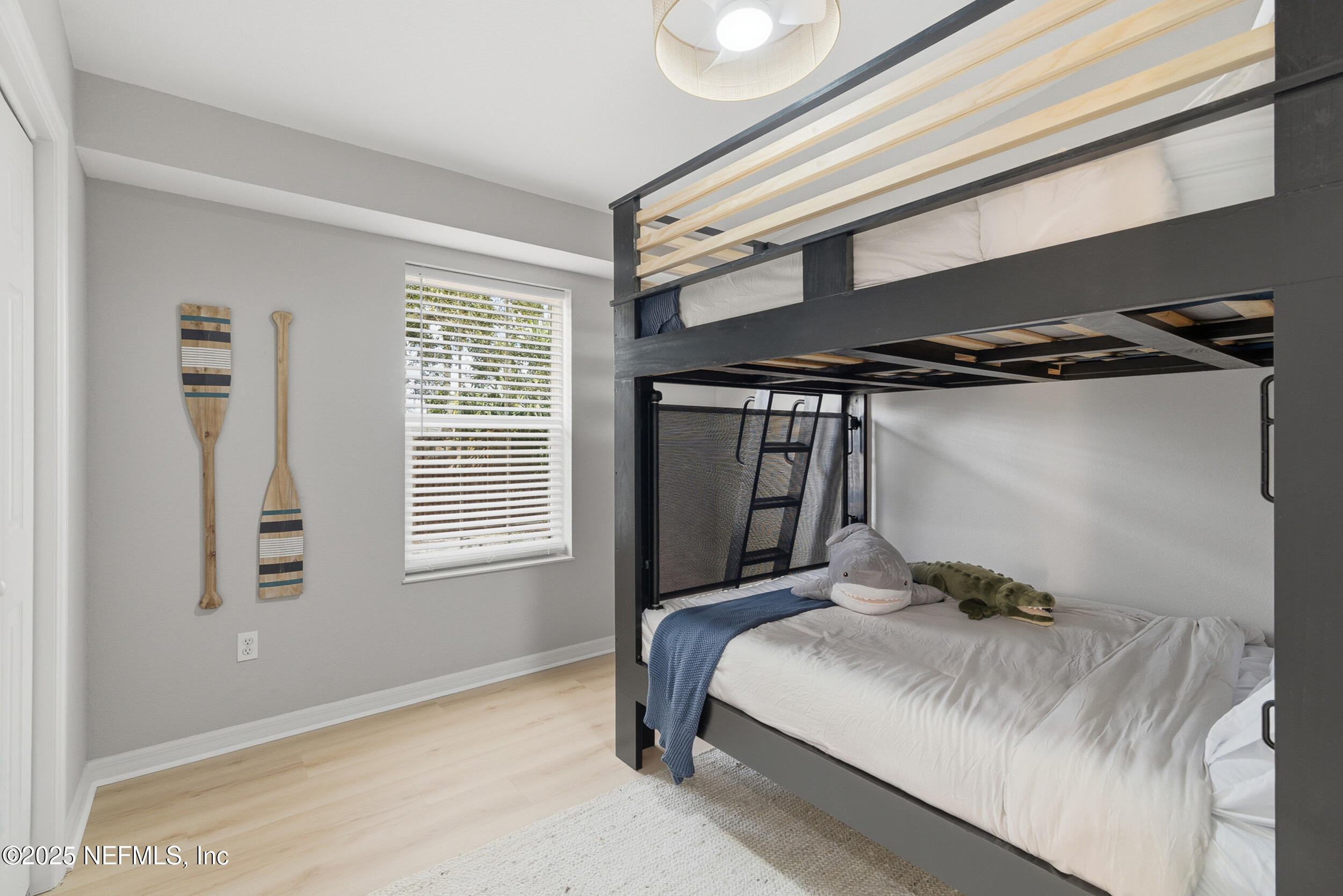 2 A Moultrie Place St. Augustine, FL 32080 - Photo 31 of 69 a bedroom with a bed and a window