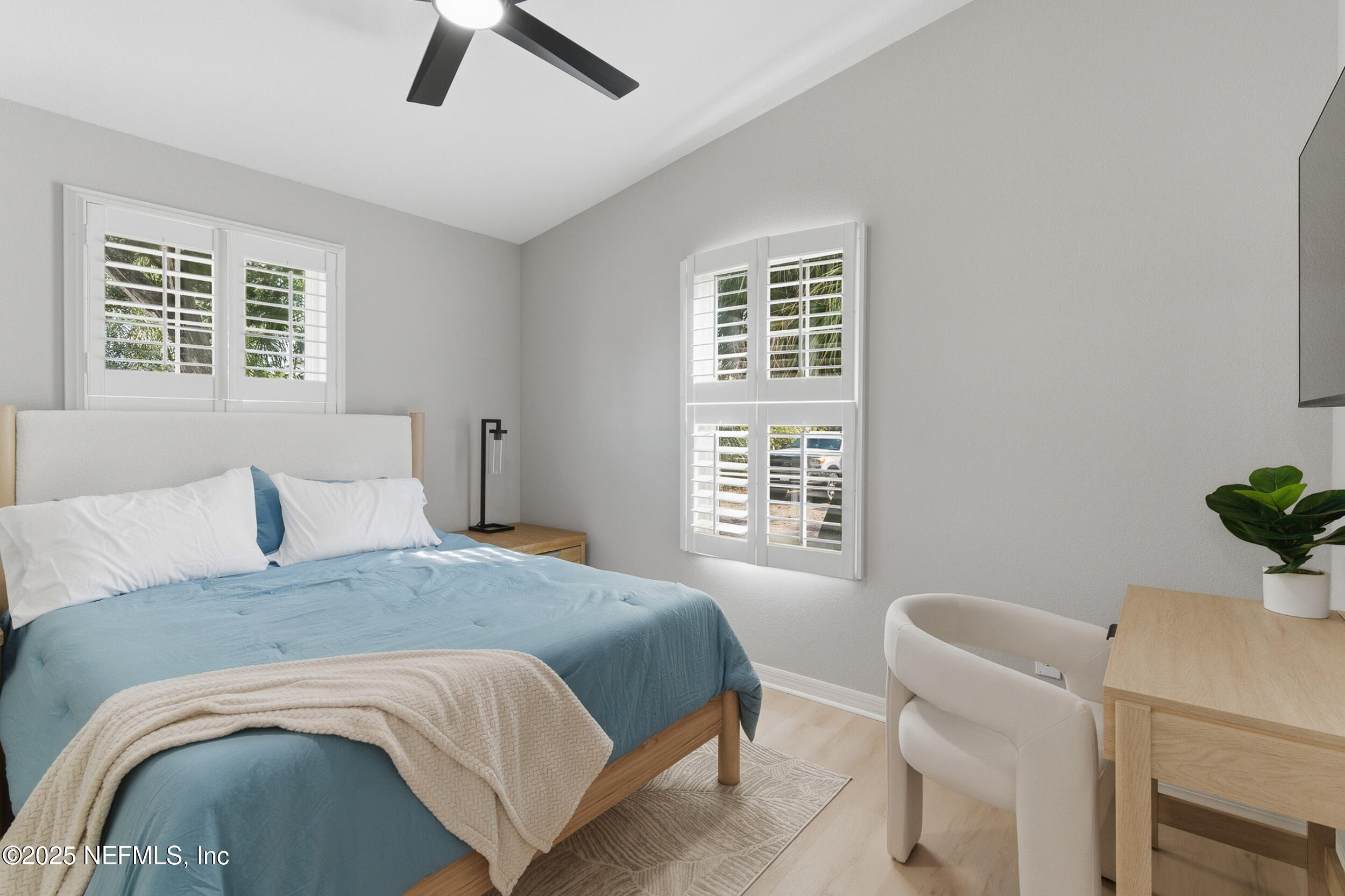 2 A Moultrie Place St. Augustine, FL 32080 - Photo 33 of 69 a bedroom with a bed and a window