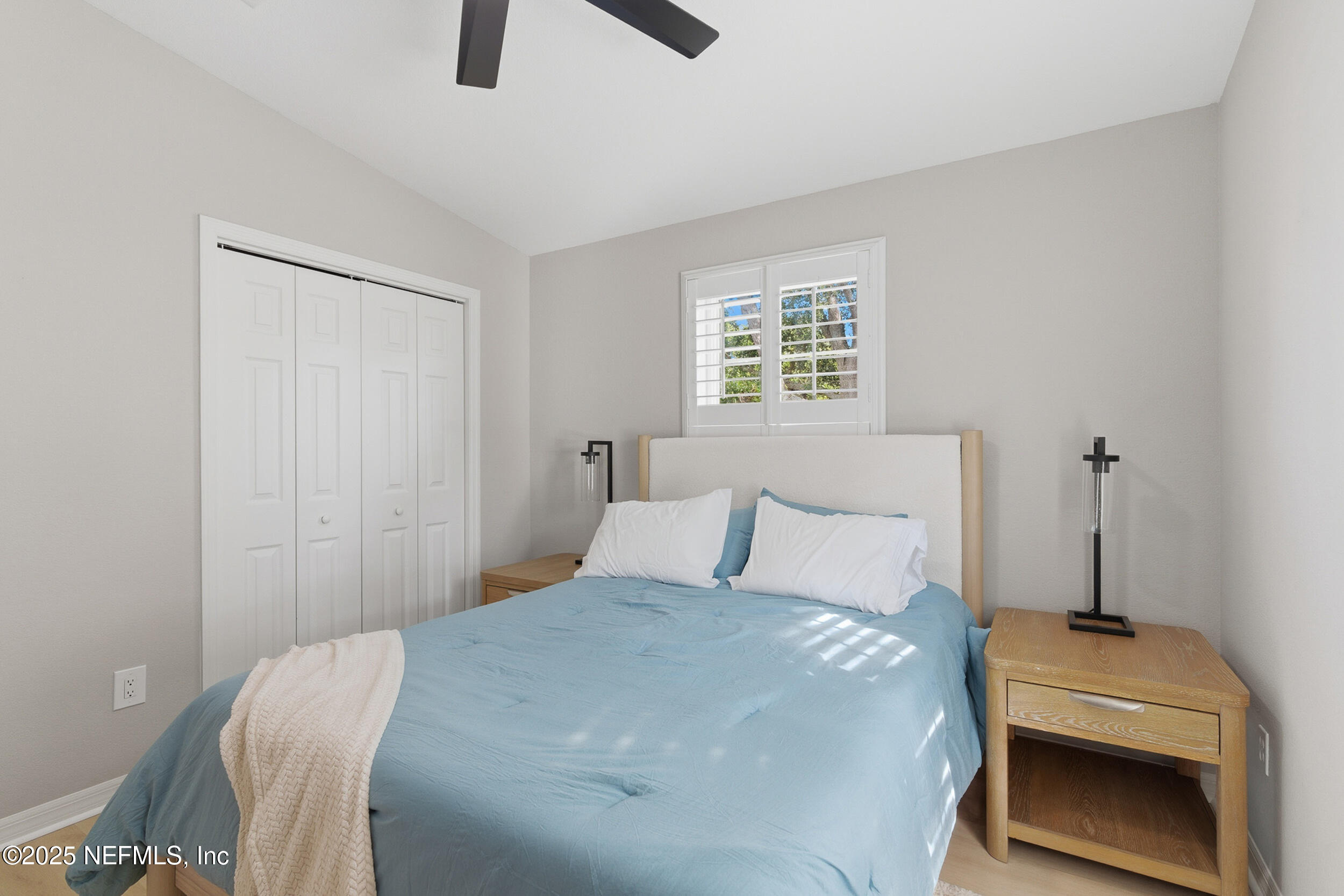 2 A Moultrie Place St. Augustine, FL 32080 - Photo 35 of 69 a bedroom with a bed and a fireplace