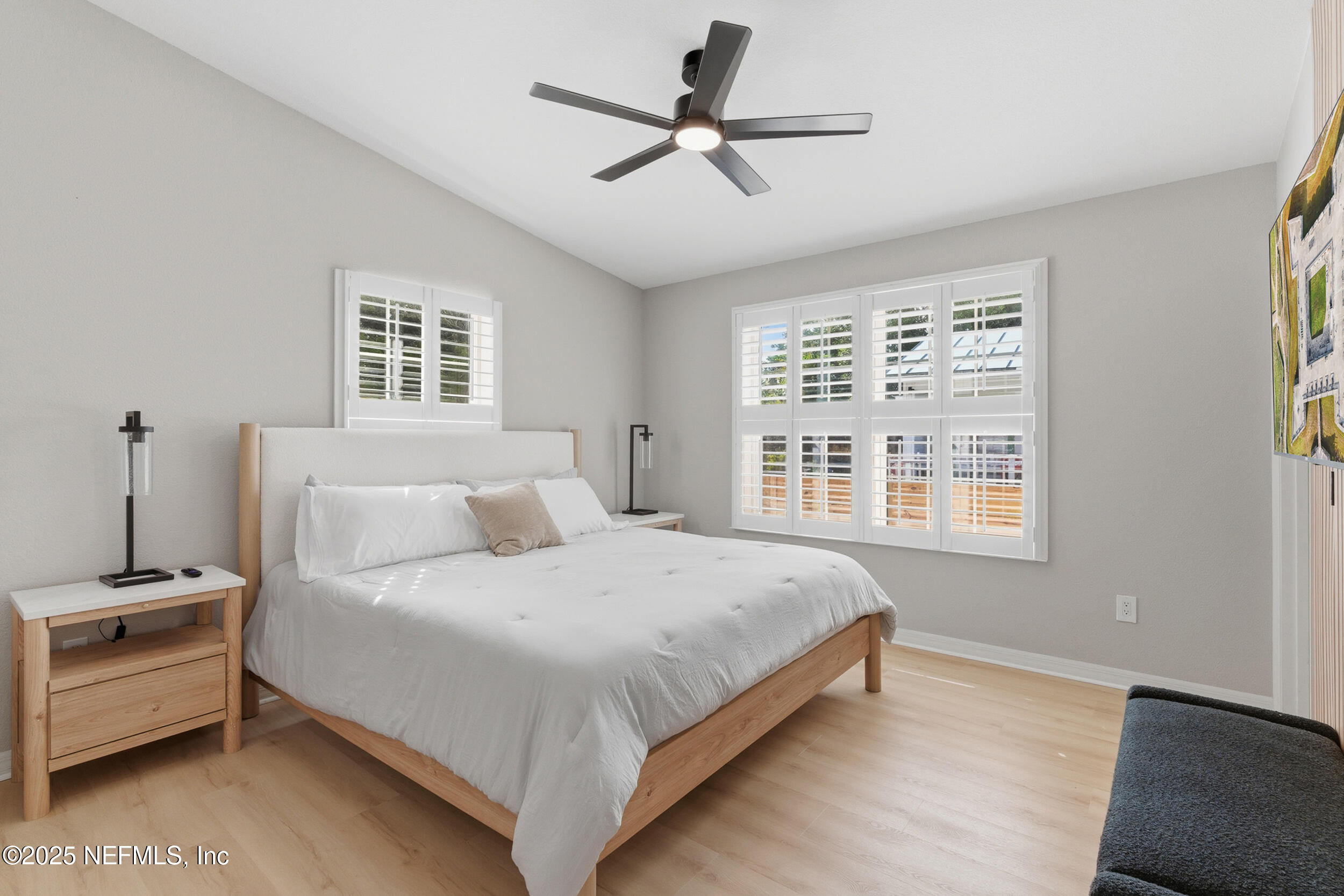 2 A Moultrie Place St. Augustine, FL 32080 - Photo 38 of 69 a bedroom with a bed a window and a chandelier