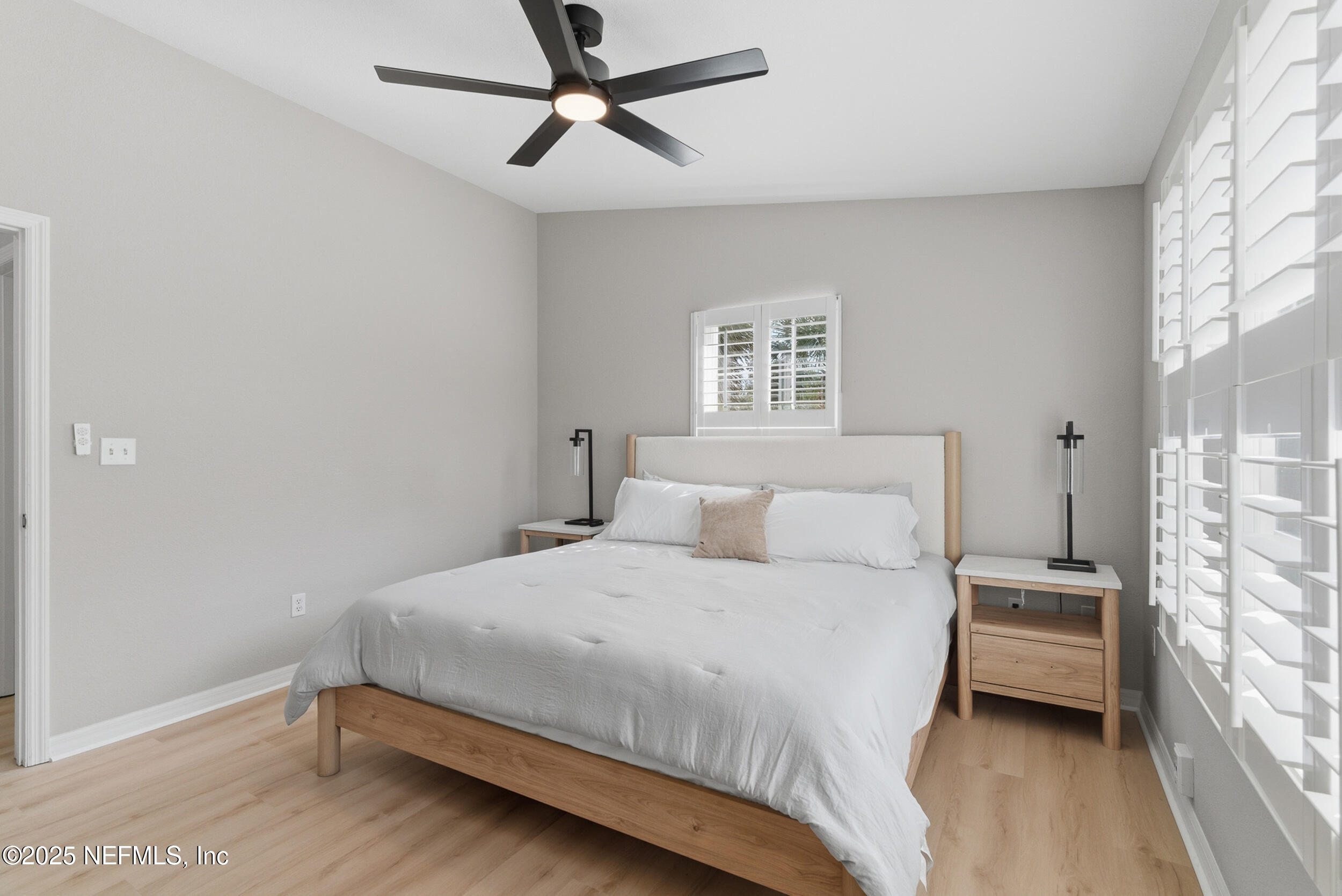 2 A Moultrie Place St. Augustine, FL 32080 - Photo 39 of 69 a bedroom with a bed and a window