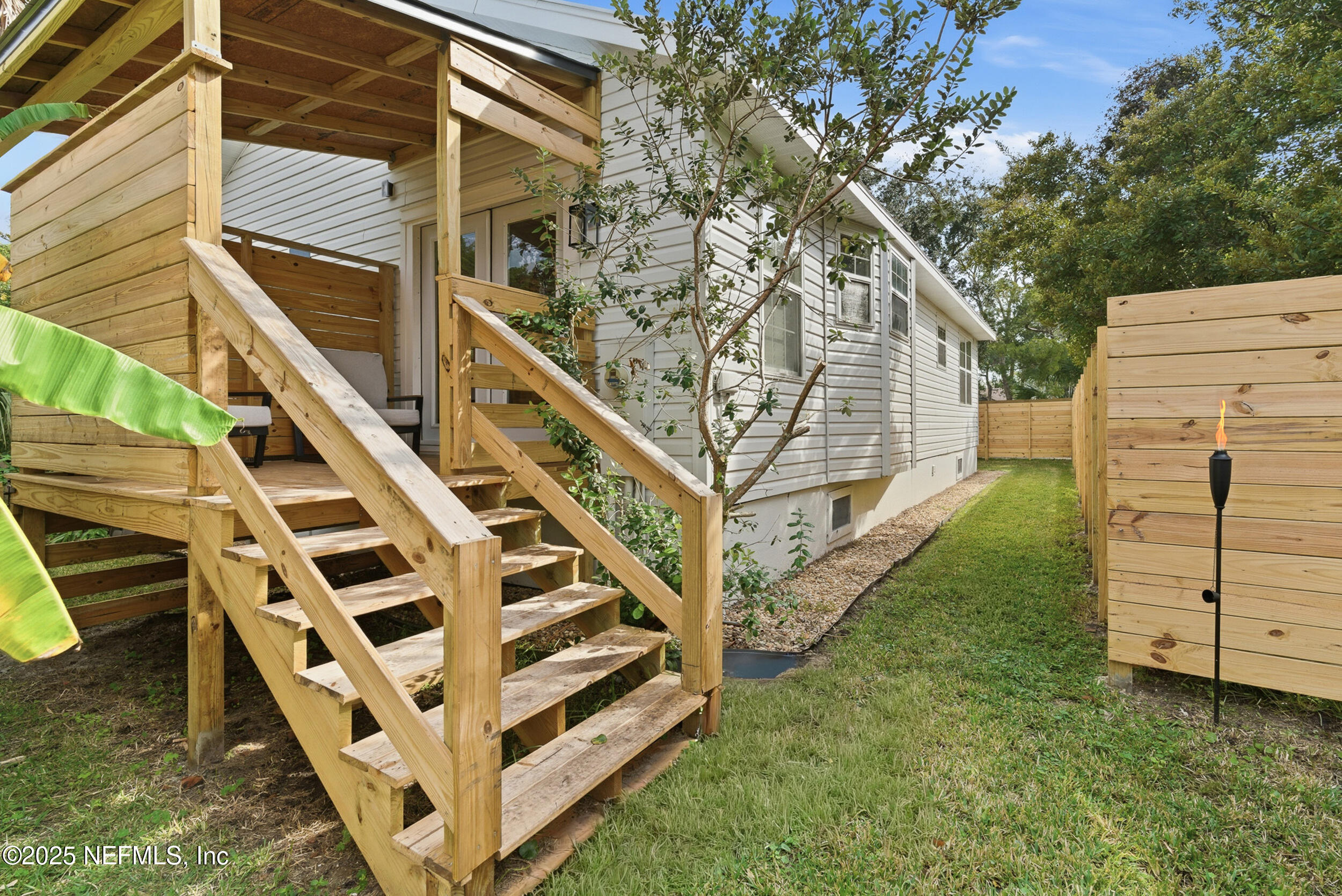 2 A Moultrie Place St. Augustine, FL 32080 - Photo 44 of 69 a view of wooden house with a yard