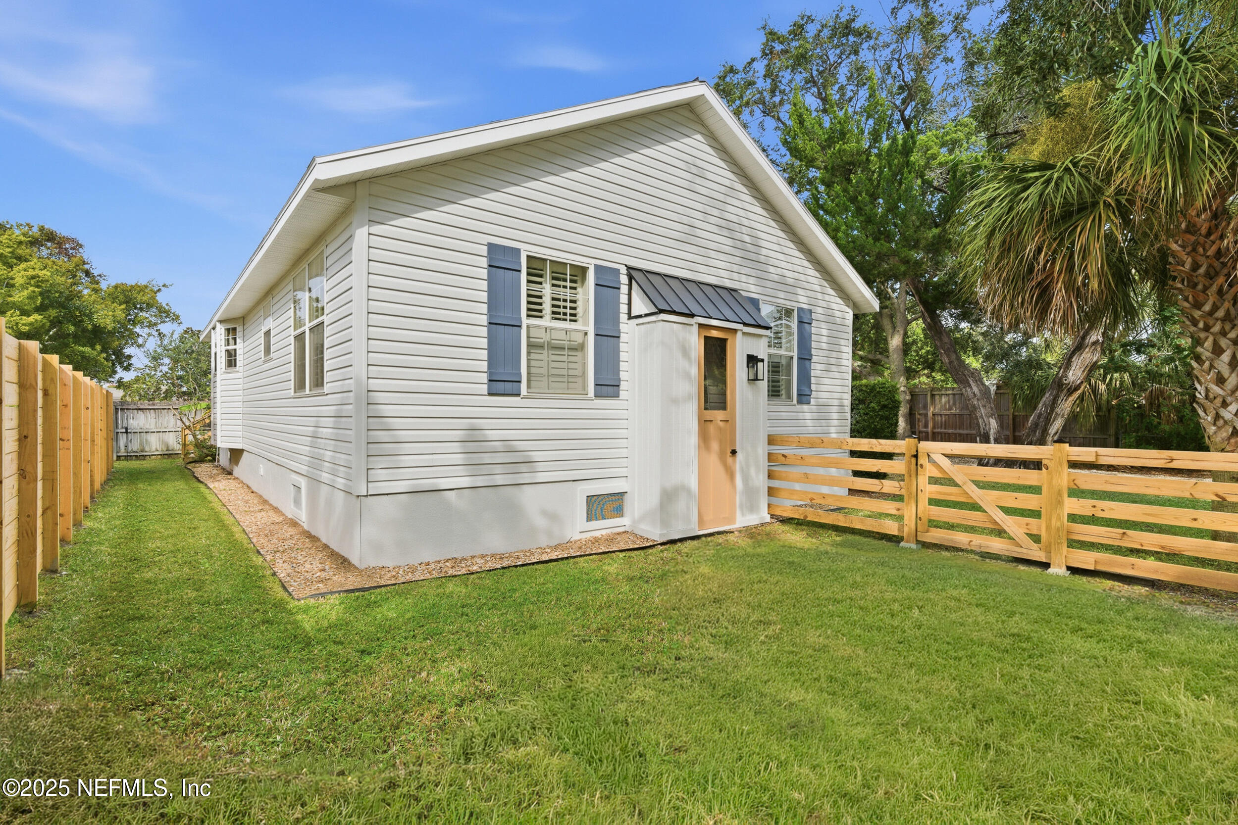 2 A Moultrie Place St. Augustine, FL 32080 - Photo 45 of 69 a view of a house with a yard