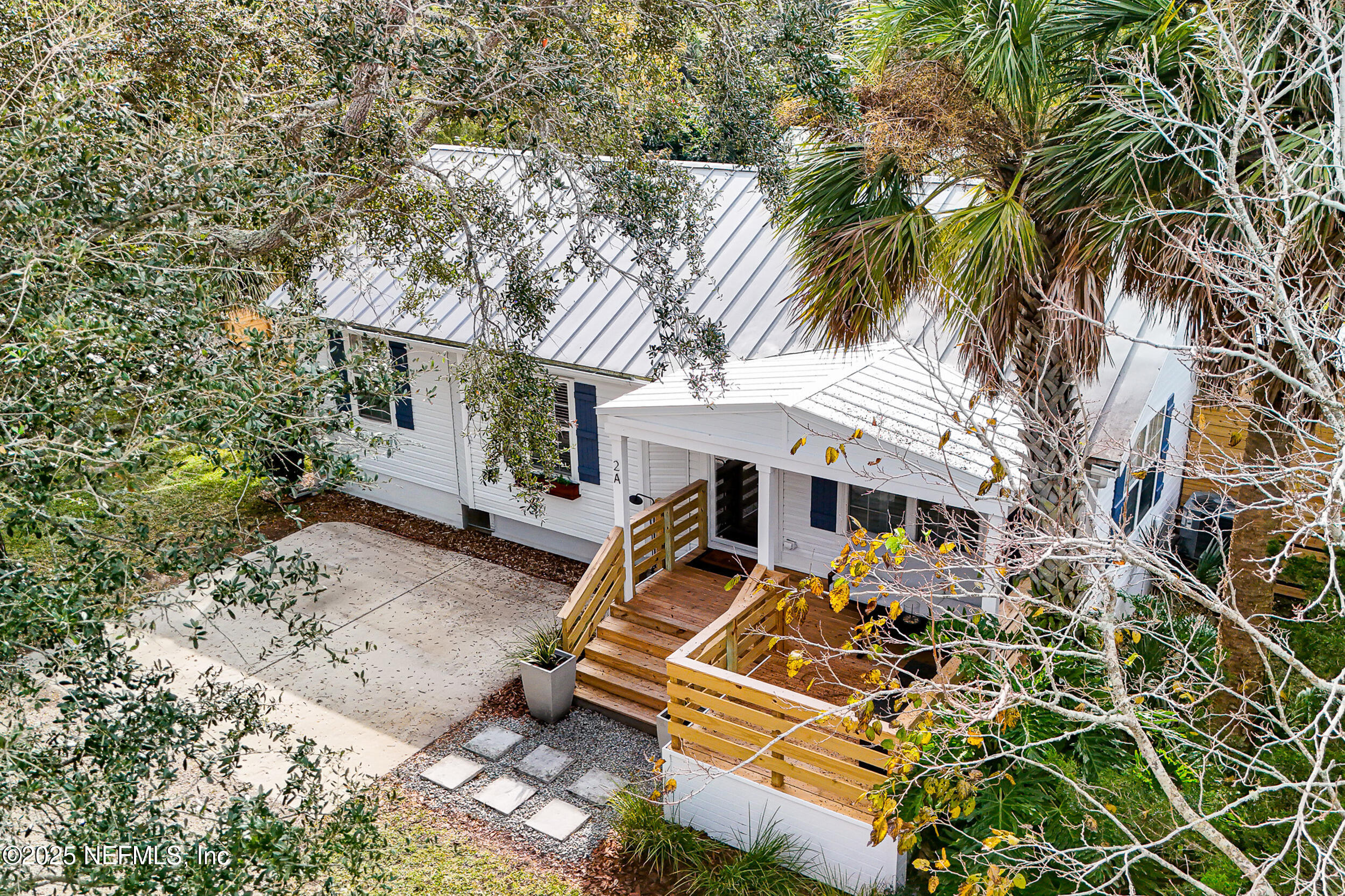 2 A Moultrie Place St. Augustine, FL 32080 - Photo 50 of 69 front view of a house with a yard