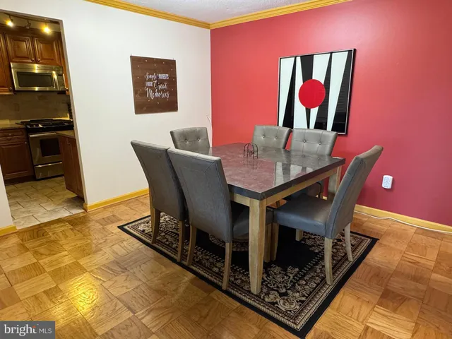 a view of a dining room with furniture