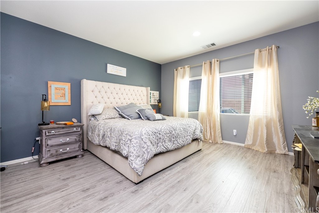 6838 Reflection Way Jurupa Valley, CA 92509 - Photo 3 of 31 MASTER BEDROOM