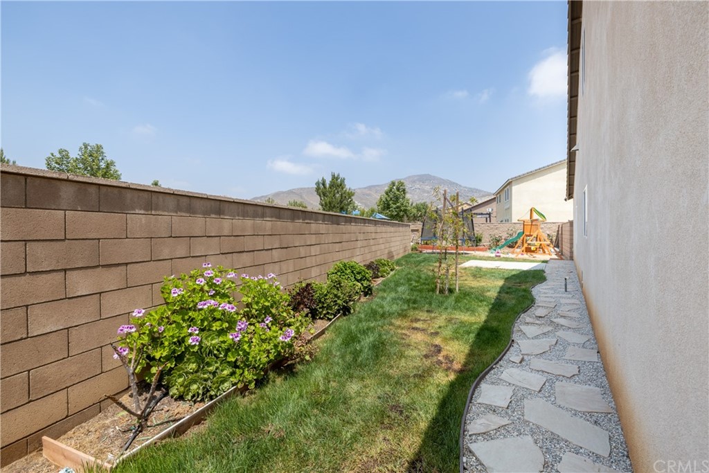 6838 Reflection Way Jurupa Valley, CA 92509 - Photo 28 of 31 RIGHT SIDE YARD