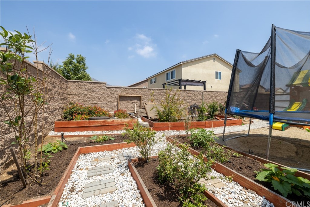6838 Reflection Way Jurupa Valley, CA 92509 - Photo 30 of 31 RIGHT SIDE YARD GARDEN
