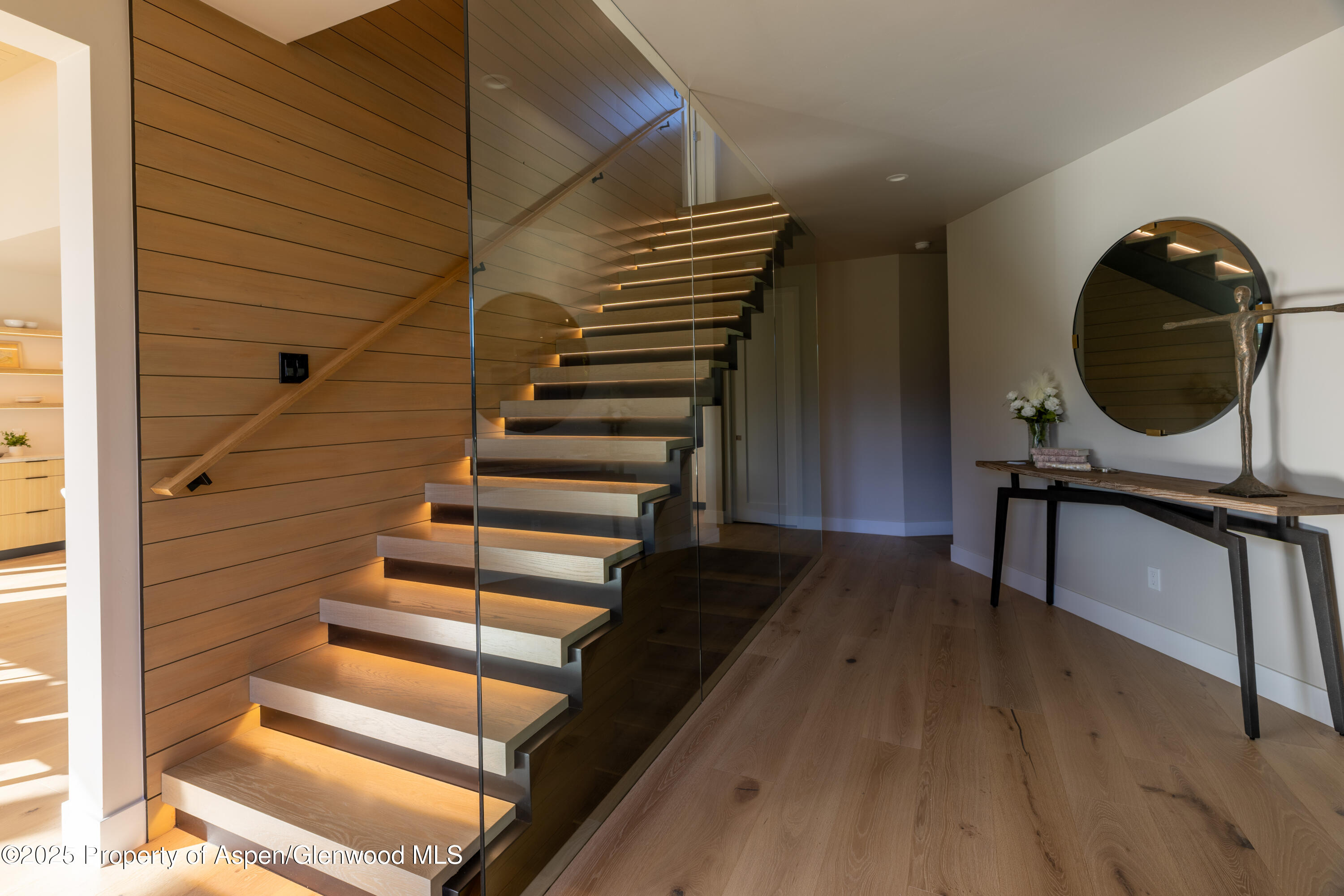 719 Perry Ridge Carbondale, CO 81623 - Photo 19 of 68 a view of entryway and hall with wooden floor