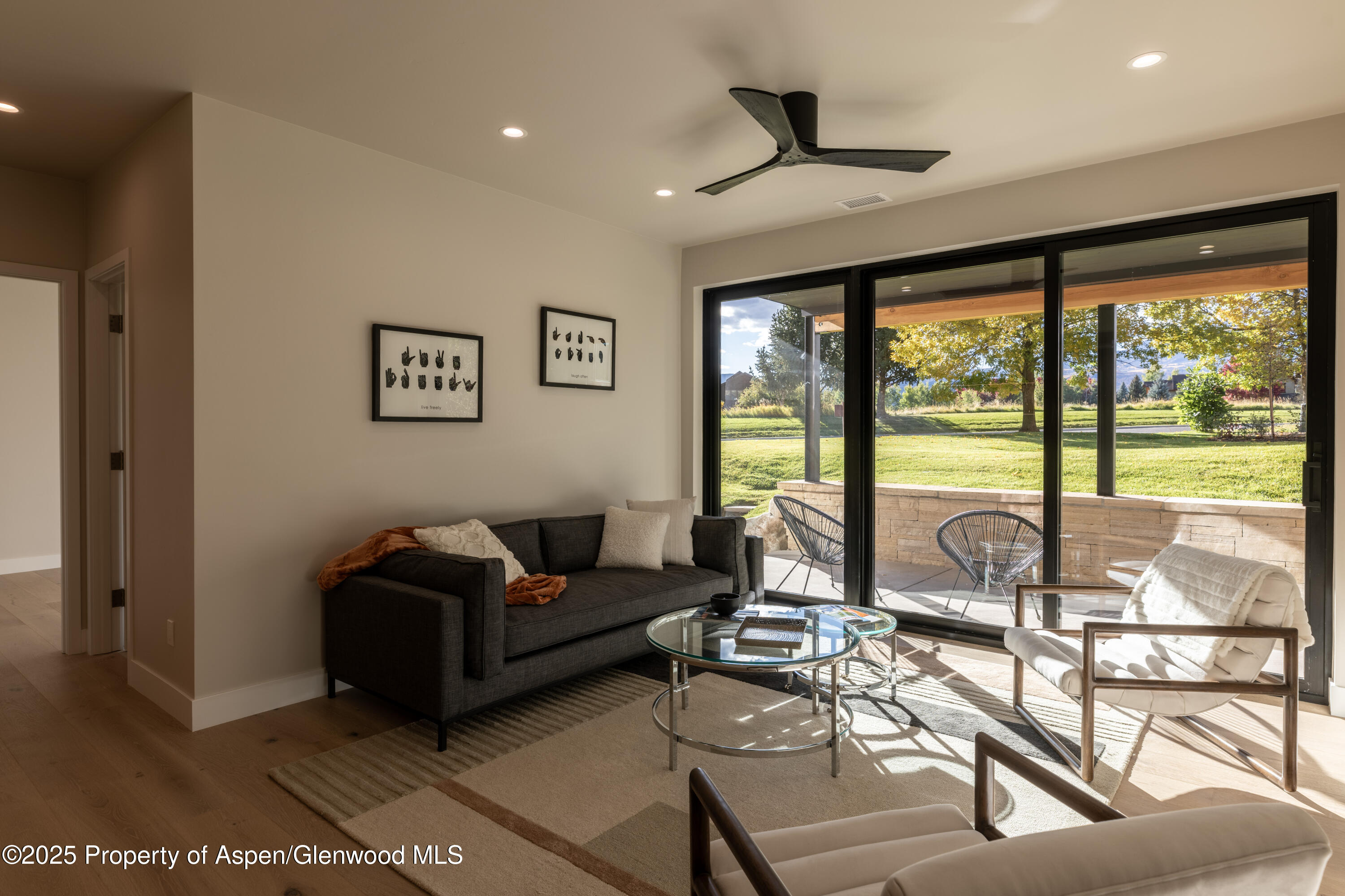 719 Perry Ridge Carbondale, CO 81623 - Photo 34 of 68 a living room with furniture and a large window
