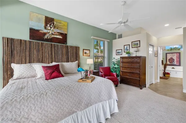 a bedroom with a bed and closet