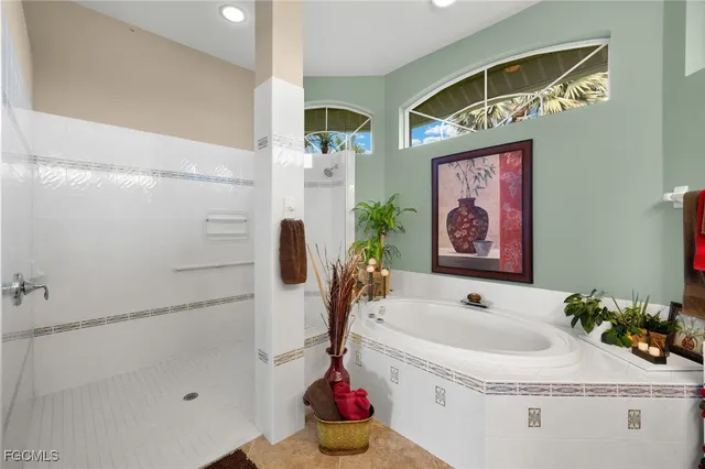 a bathroom with a sink and a shower