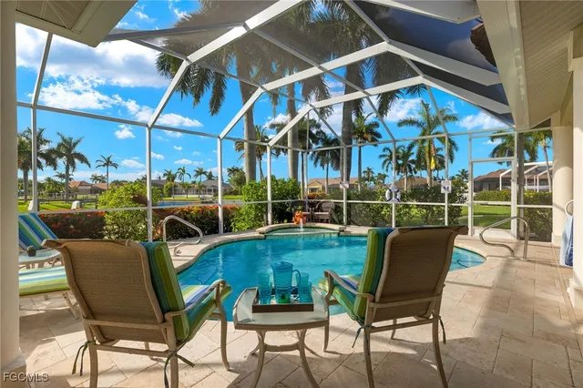 a view of a chairs and tables in the patio