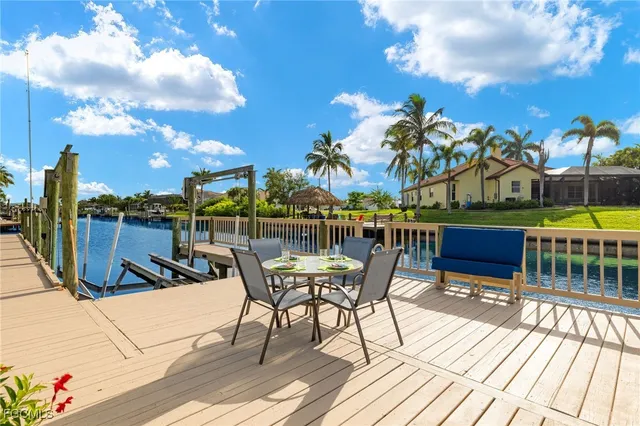 a view of a chairs and table on the terrace