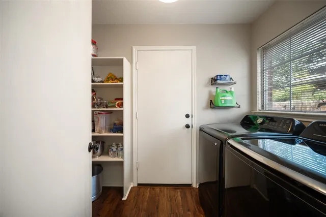 a kitchen with a sink and a stove
