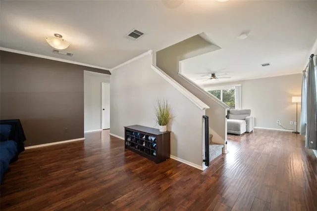 a view of livingroom with hardwood and furniture