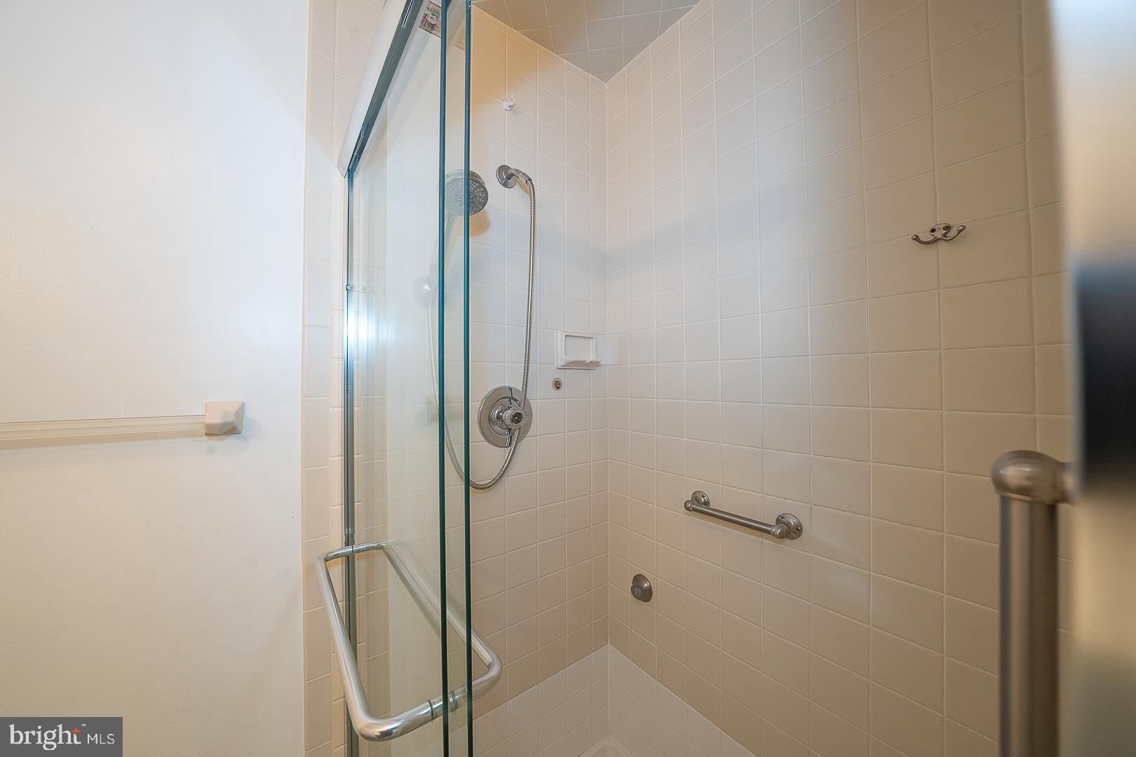 102 Beacon Square Wayne, PA 19087 - Photo 23 of 48 Modern glass shower with sleek design.