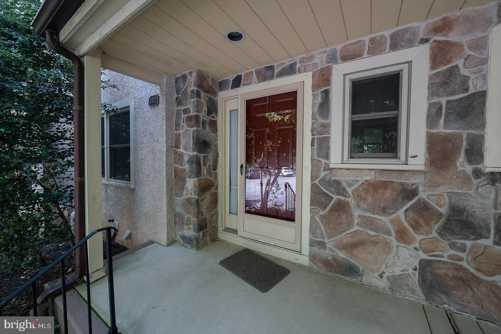 102 Beacon Square Wayne, PA 19087 - Photo 3 of 48 Charming entryway with stone accents.