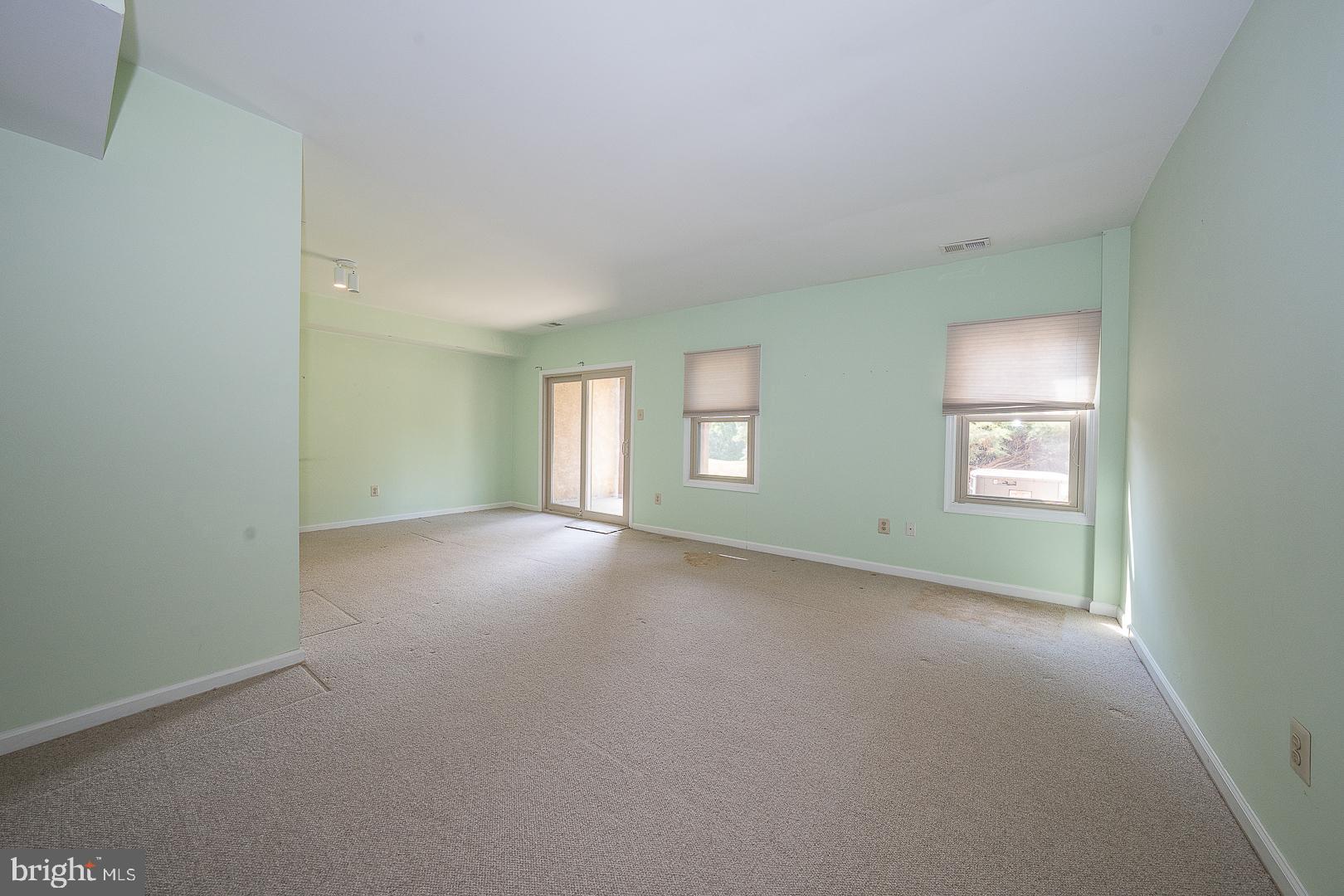 102 Beacon Square Wayne, PA 19087 - Photo 32 of 48 Spacious room with soft green hues.