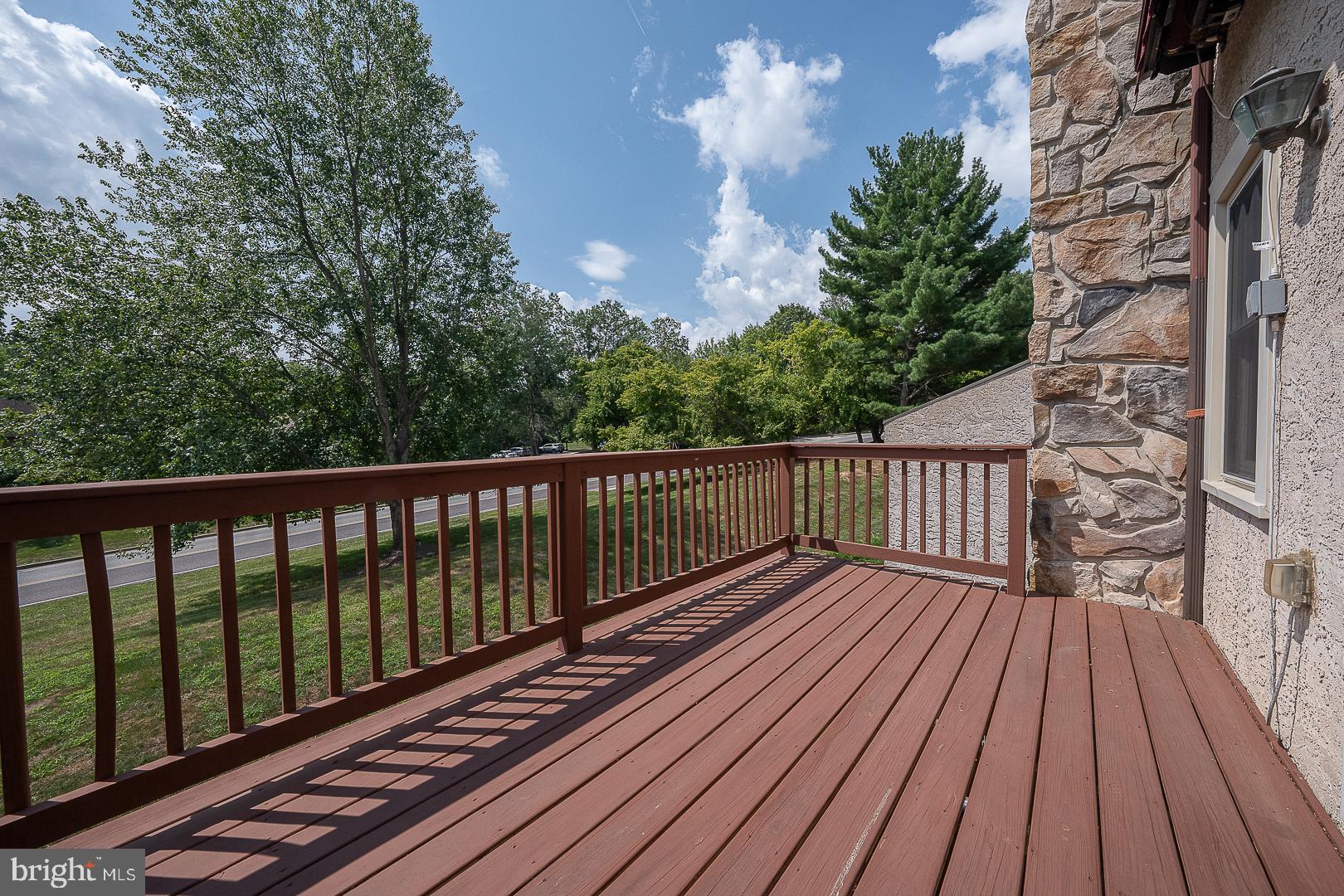 102 Beacon Square Wayne, PA 19087 - Photo 44 of 48 Sunny deck with scenic greenery views.