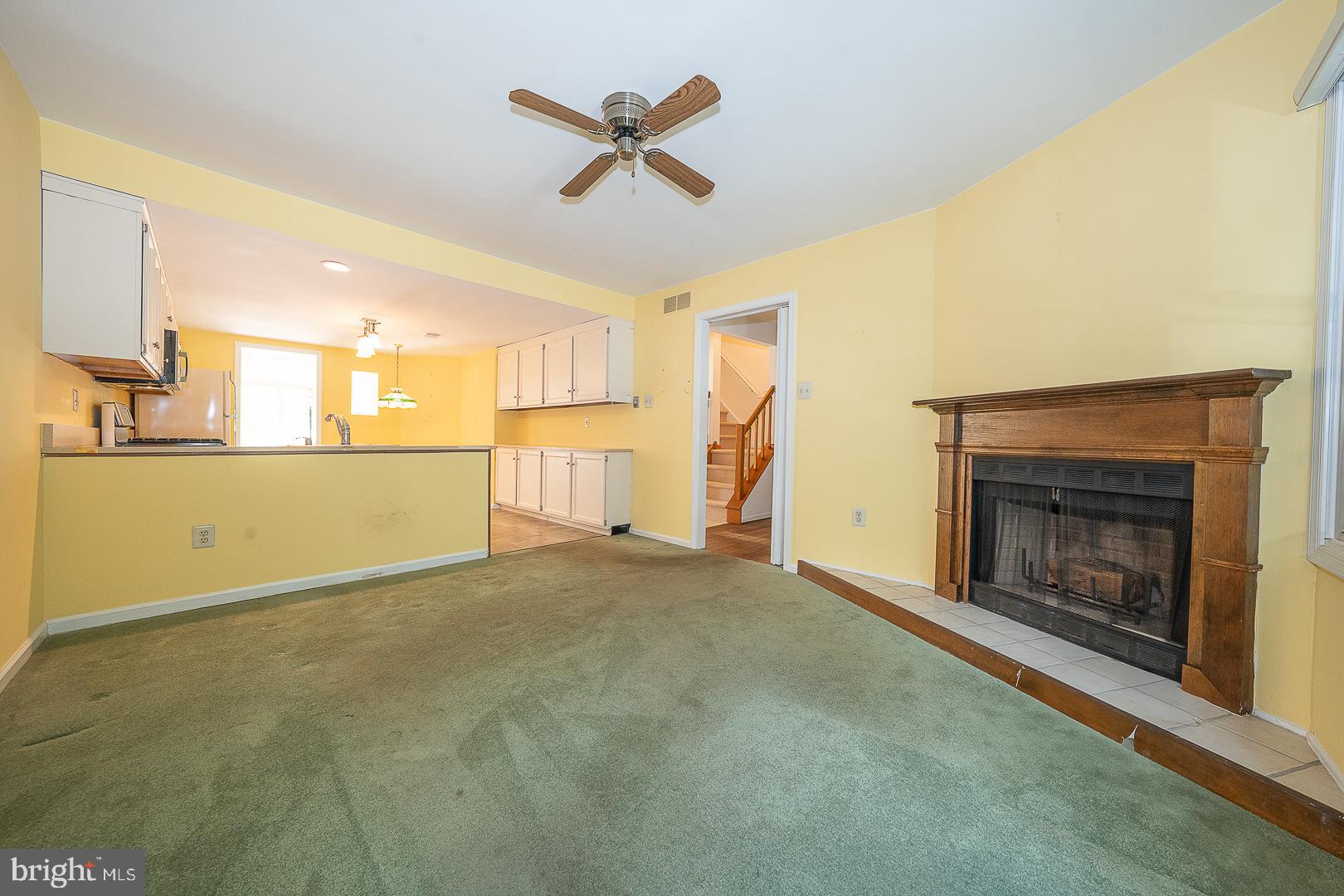 102 Beacon Square Wayne, PA 19087 - Photo 8 of 48 Bright, inviting space with cozy fireplace.