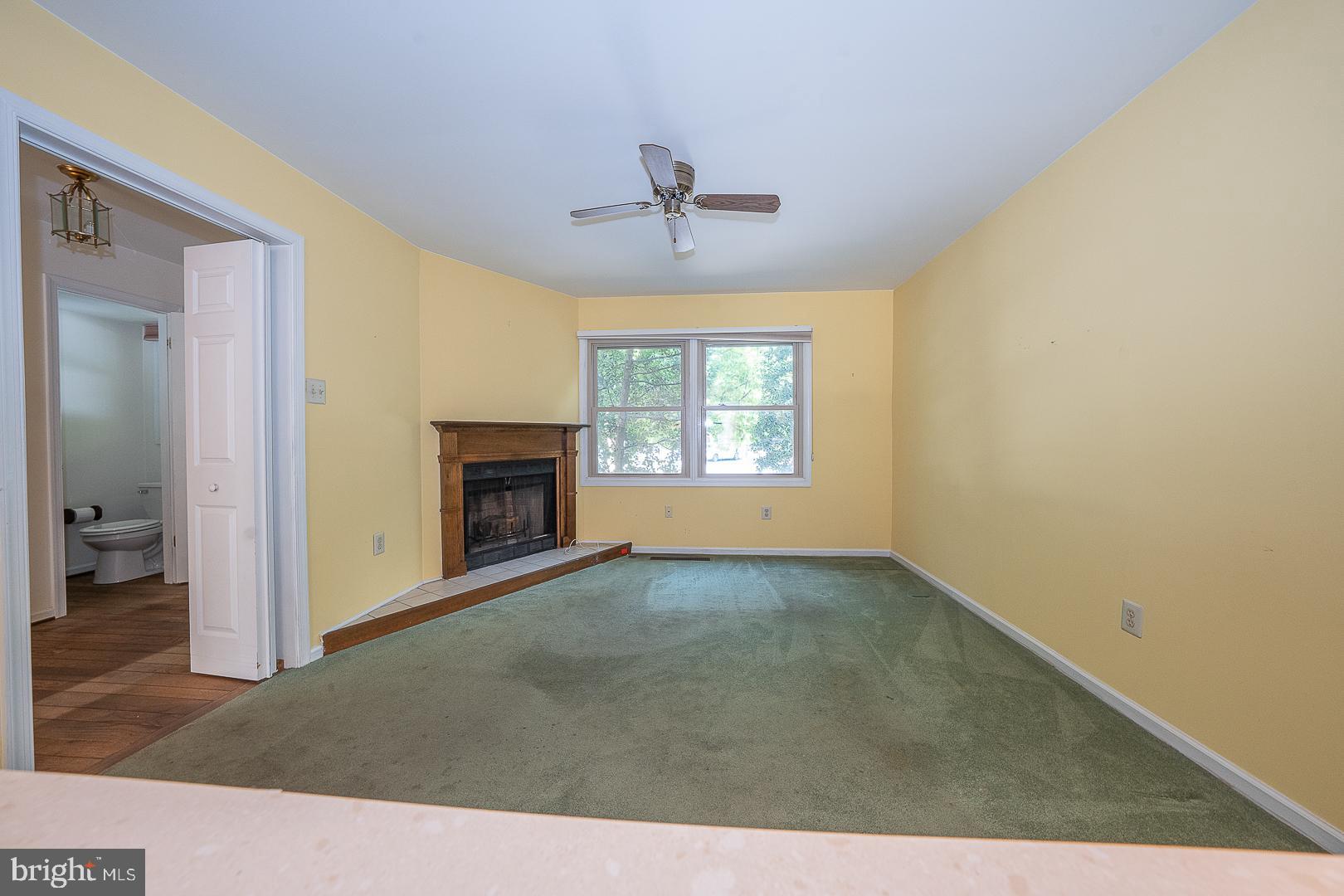 102 Beacon Square Wayne, PA 19087 - Photo 9 of 48 Bright, inviting space with cozy fireplace.