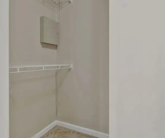 a view of small space with racks on the wall