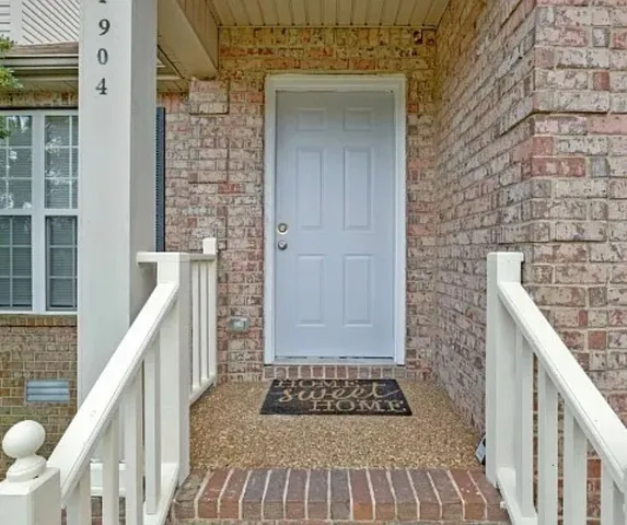 a view of entryway with a front door