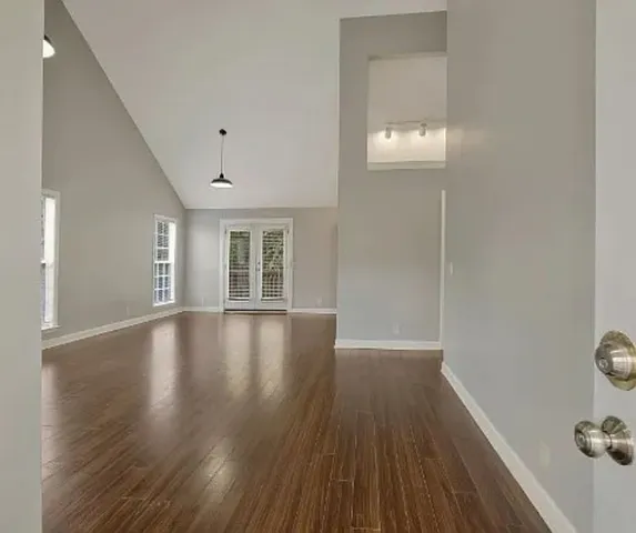 a view of livingroom with hardwood floor and window