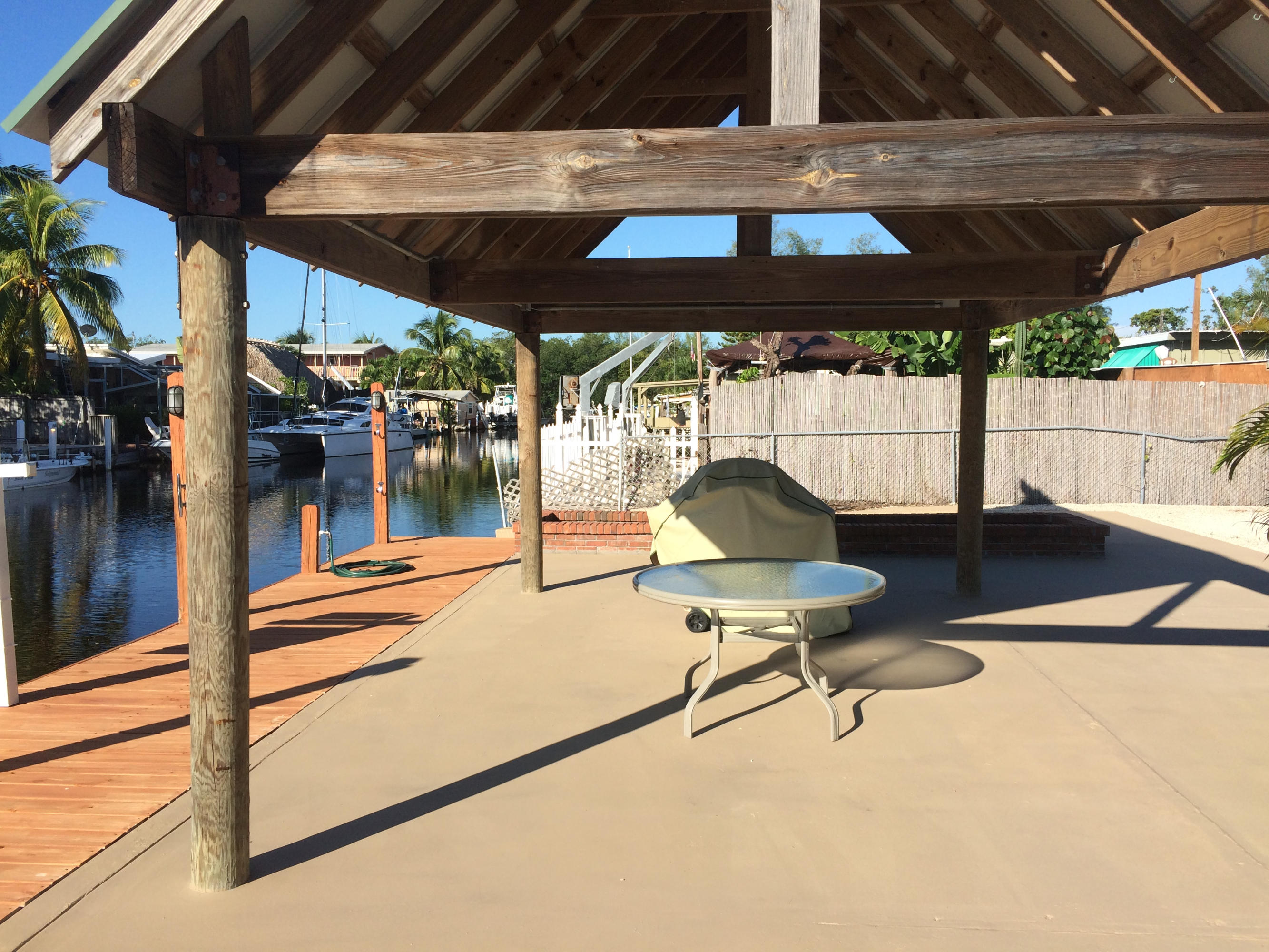 444 Bahia Honda Road Key Largo, FL 33037 - Photo 3 of 13 Backyard/dockage/chickee hut