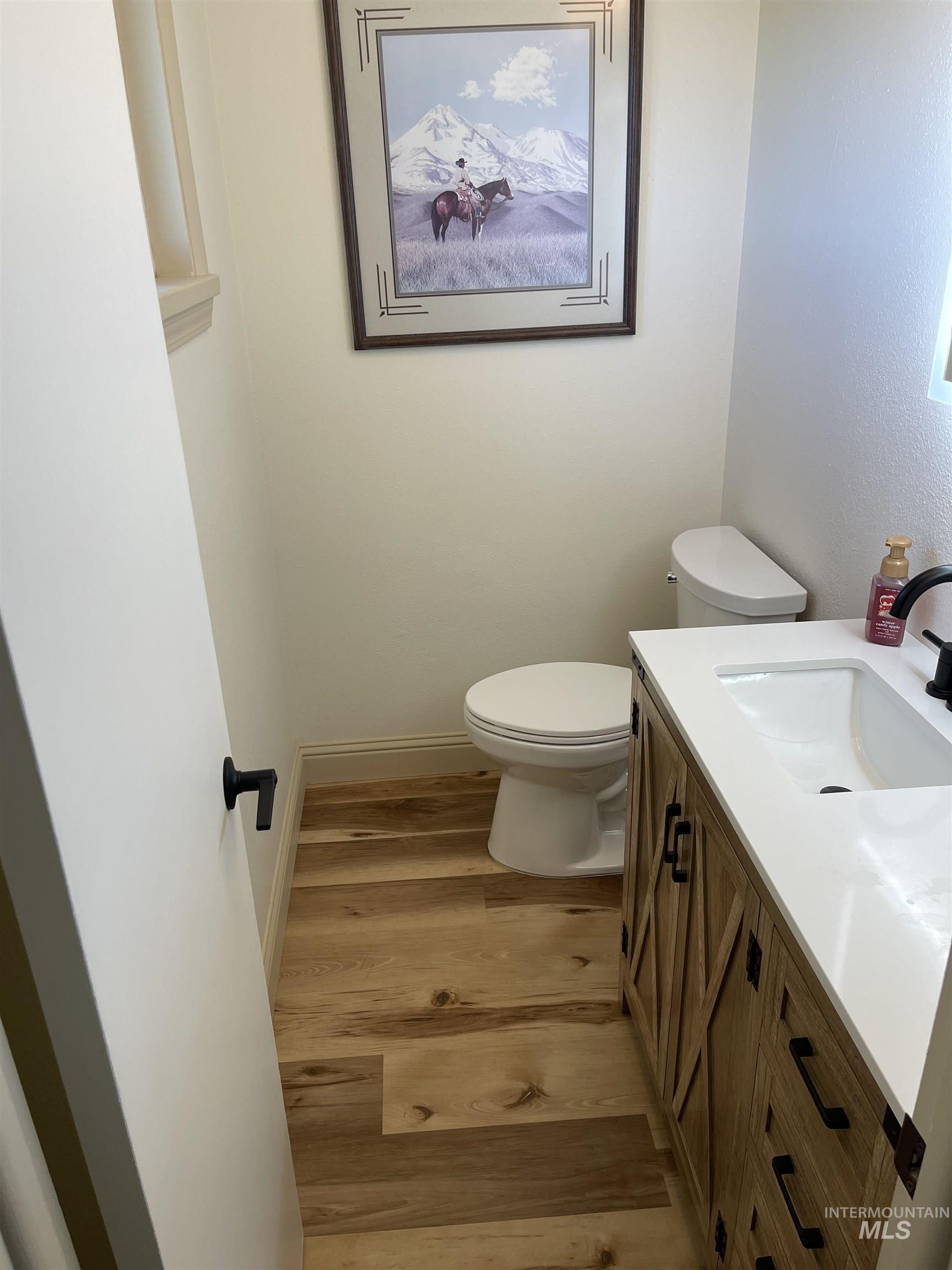 2155 East 1775 South Gooding, ID 83330 - Photo 5 of 18 Half bath featuring vanity and light wood finished floors
