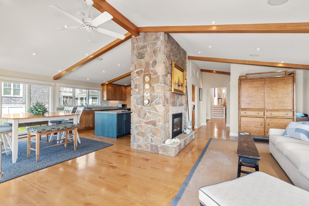 1 Beach View Road West Dennis, MA 02670 - Photo 4 of 20 a living room with fireplace furniture and a flat screen tv