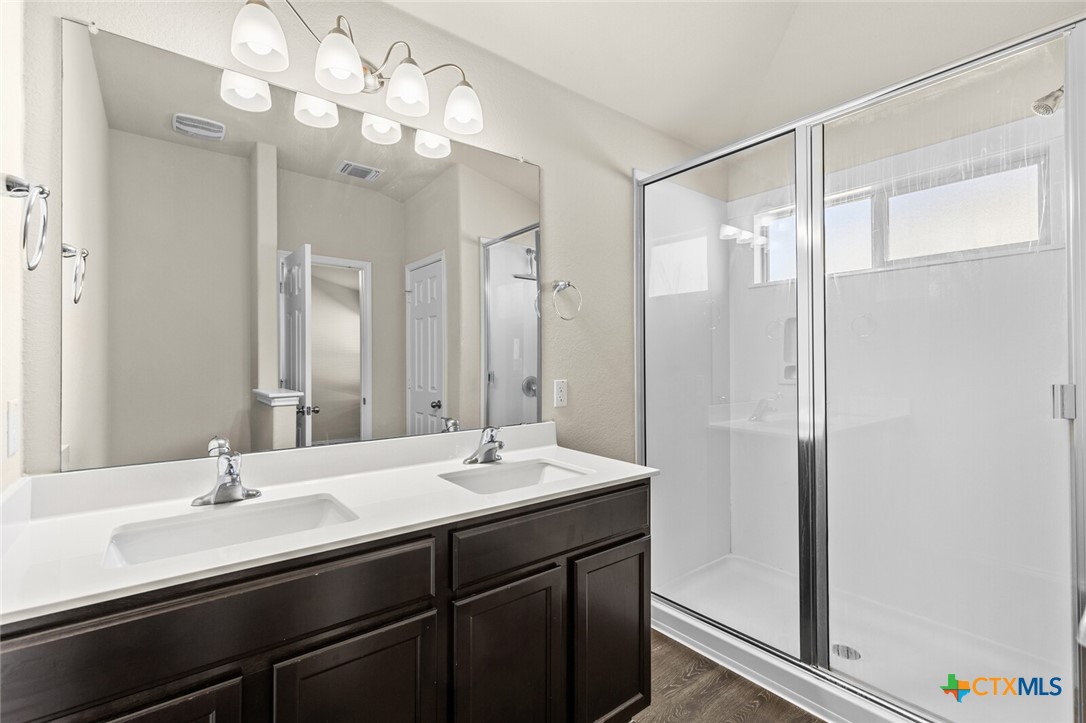 256 Bainbridge Road Temple, TX 76502 - Photo 30 of 40 a bathroom with a sink double vanity and a mirror