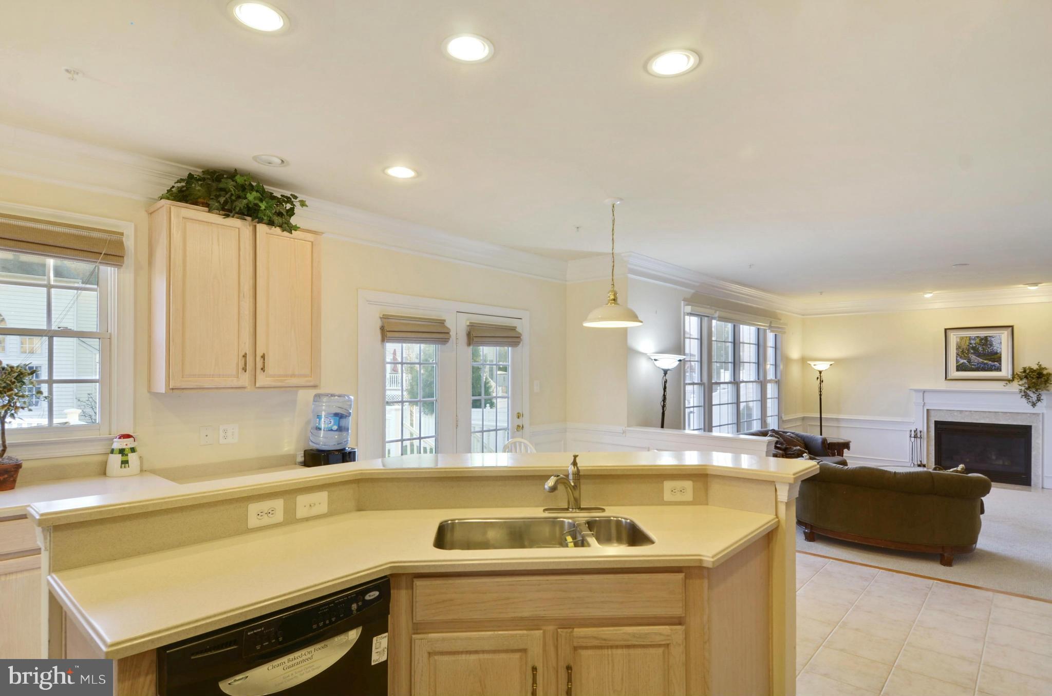 14402 Autumn Rust Road Boyds, MD 20841 - Photo 14 of 30 a kitchen with a sink and a stove top oven