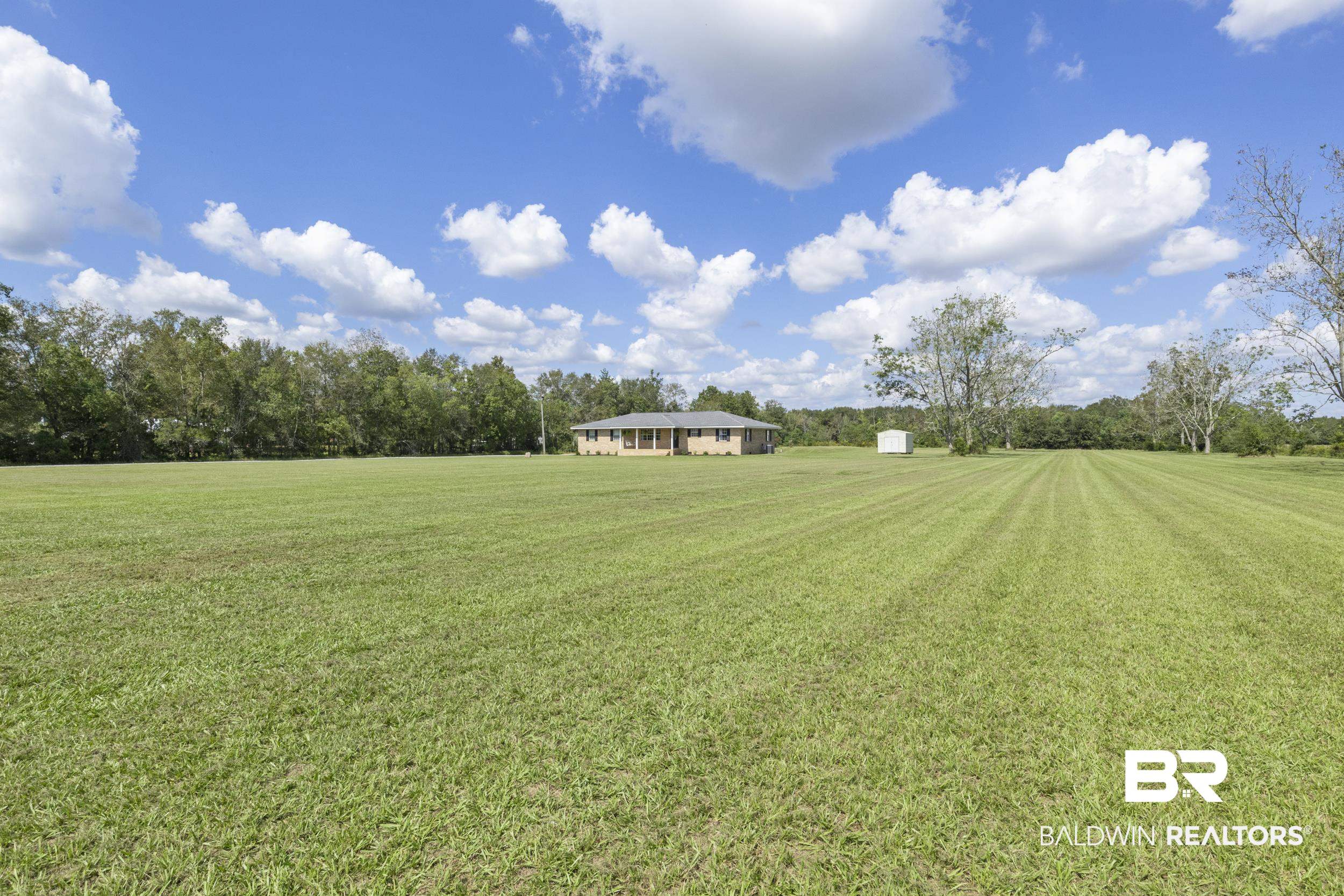 17689 Brewer Road Foley, AL 36535 - Photo 15 of 54 View of yard featuring a rural view