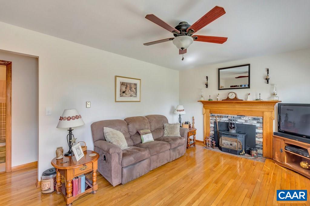 353 Locust Lane Ruckersville, VA 22968 - Photo 11 of 22 a living room with furniture and a fireplace