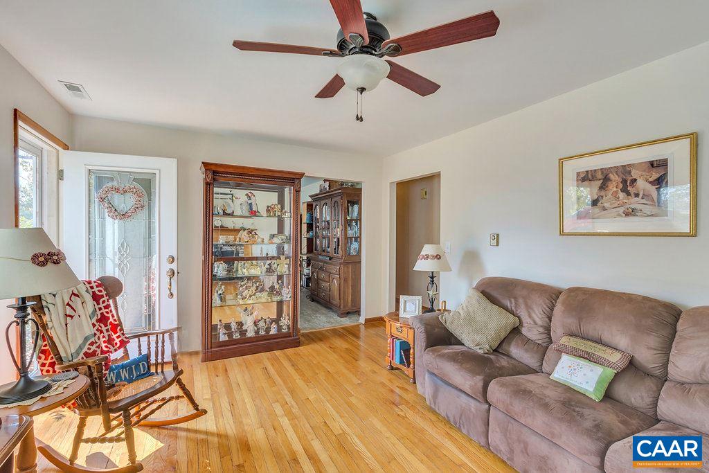 353 Locust Lane Ruckersville, VA 22968 - Photo 10 of 22 a living room with furniture and a flat screen tv