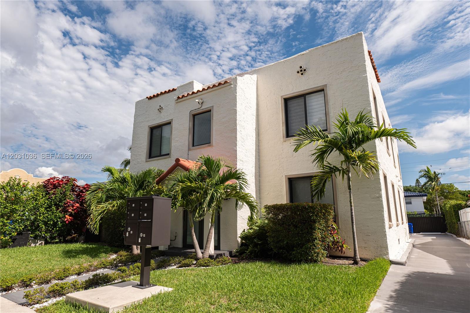 1721 Southwest 13th Street, Unit 4 Miami, FL 33145 - Photo 24 of 24 a front view of a house with a yard