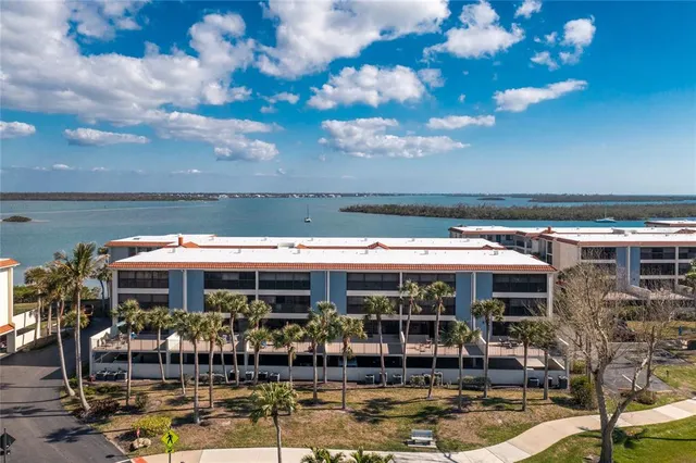 a view of a lake with a city