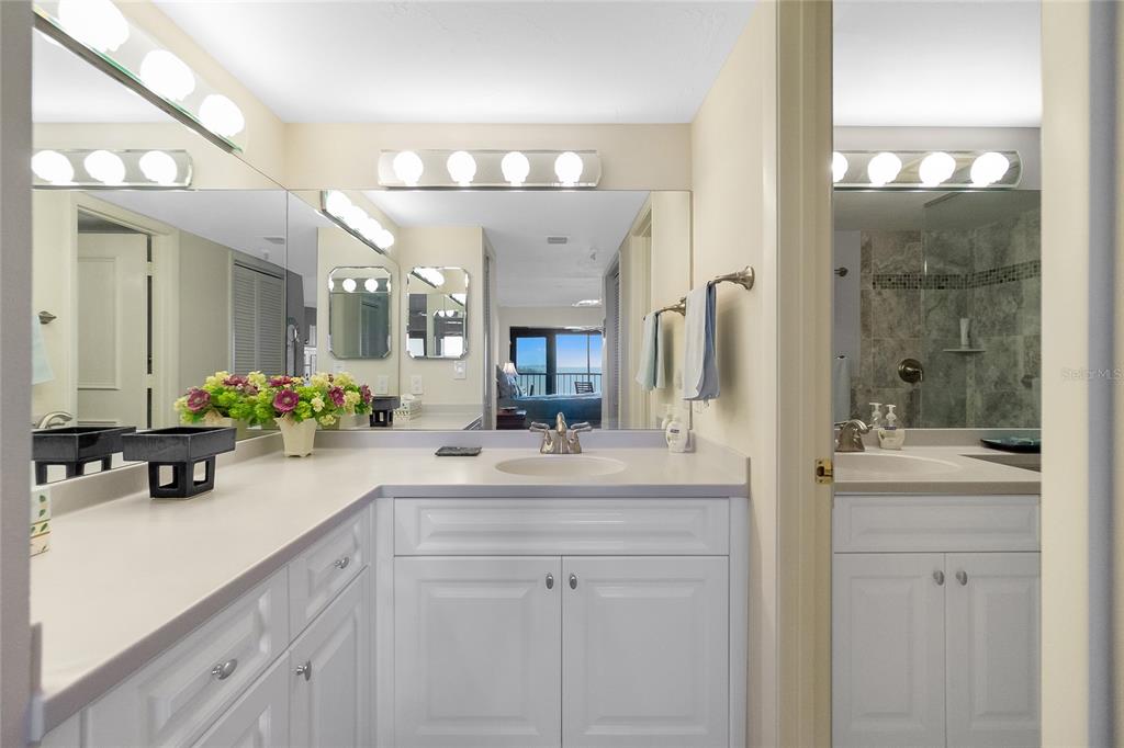 1651 Beach Road, Unit 301 Englewood, FL 34223 - Photo 27 of 68 a kitchen with a sink and cabinets