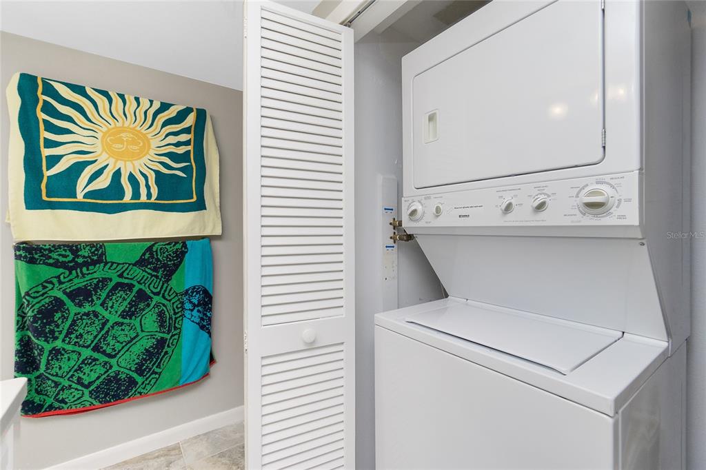 1651 Beach Road, Unit 301 Englewood, FL 34223 - Photo 35 of 68 a utility room with a washer and dryer