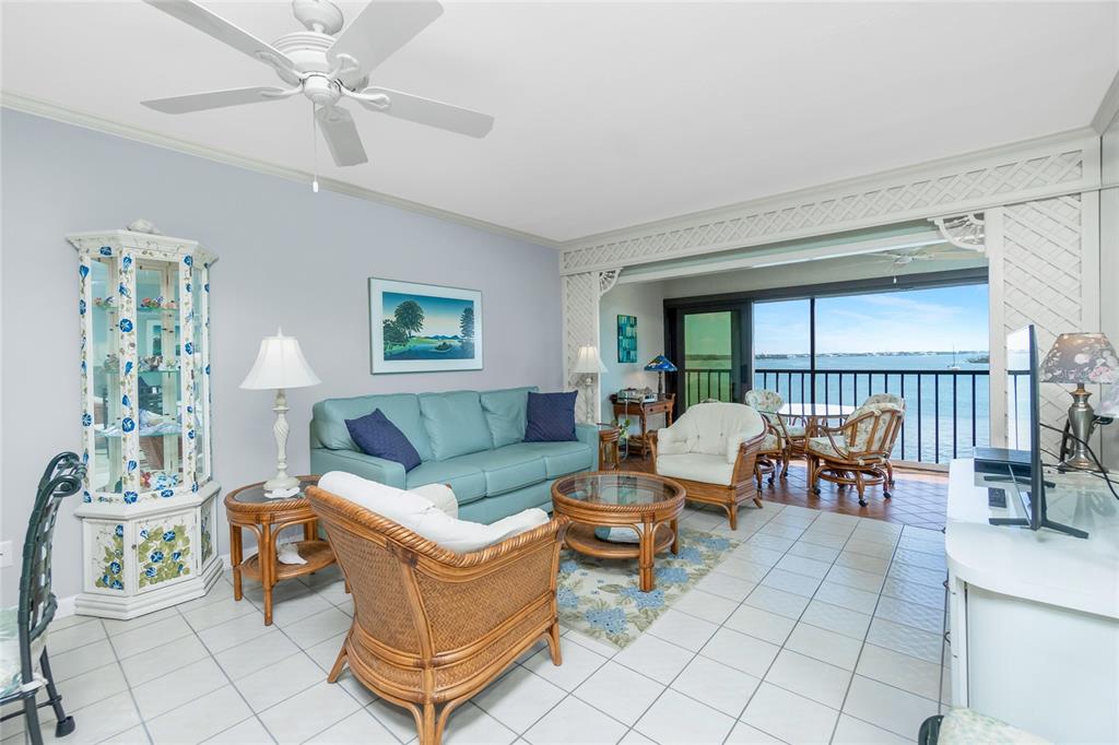 1651 Beach Road, Unit 301 Englewood, FL 34223 - Photo 5 of 68 a living room with furniture and a table