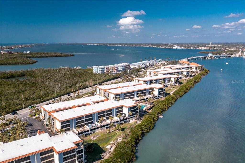 1651 Beach Road, Unit 301 Englewood, FL 34223 - Photo 52 of 68 a view of a lake with a city