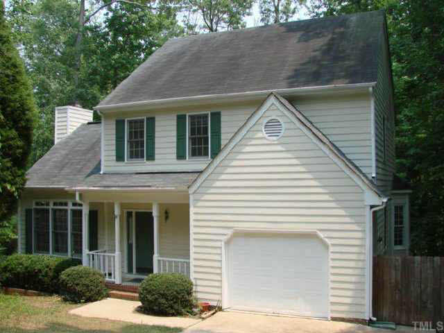 202 Kingsmill Road Cary, NC 27511 - Photo 1 of 8 a front view of a house with plants