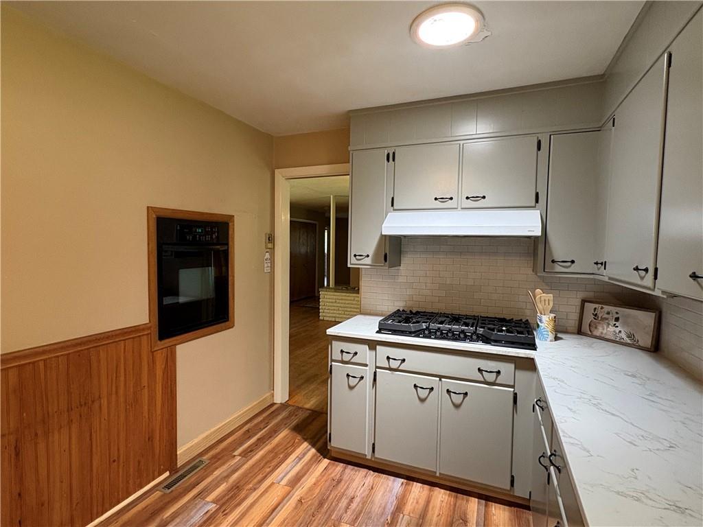 320 Cherry Hill Road Greenville, PA 16125 - Photo 12 of 38 a kitchen with stainless steel appliances a stove a sink and a refrigerator